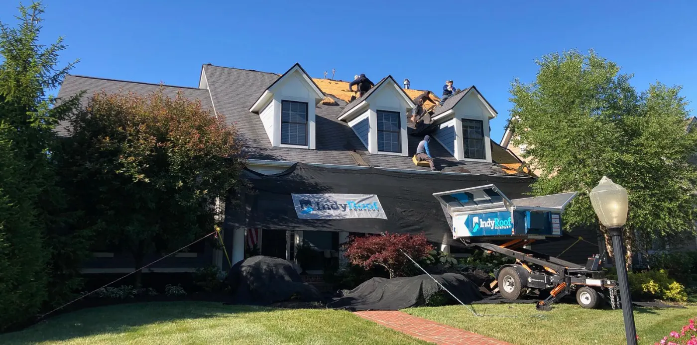 Tarping and dry-in on a State Line City commercial roof
